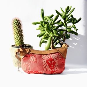 lion patterned shoulder bag